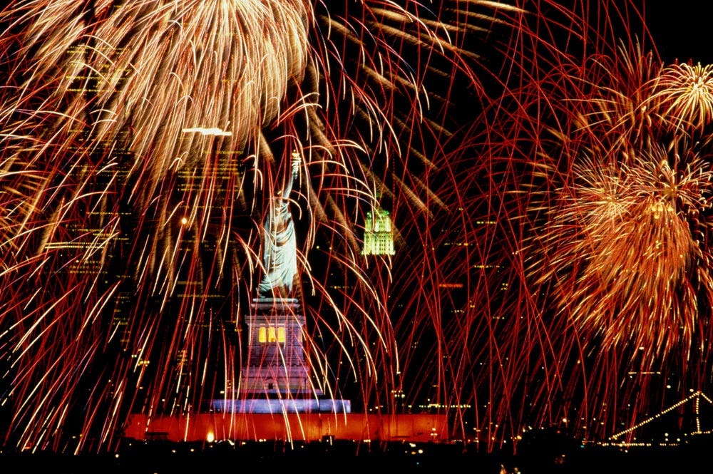 Joe McNally fireworks statue of liberty nyc fourth of july