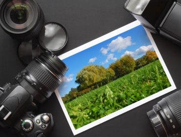 dslr camera lens and image on black background